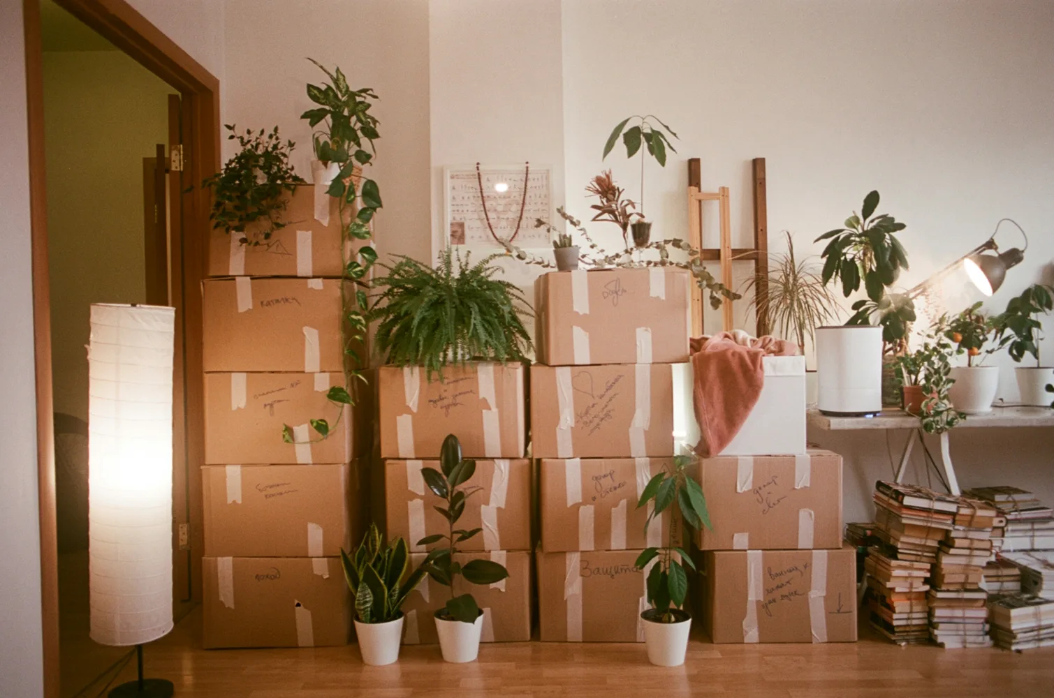 Moving boxes in a home after a parent relocates, a common reason for a custody modification in Texas